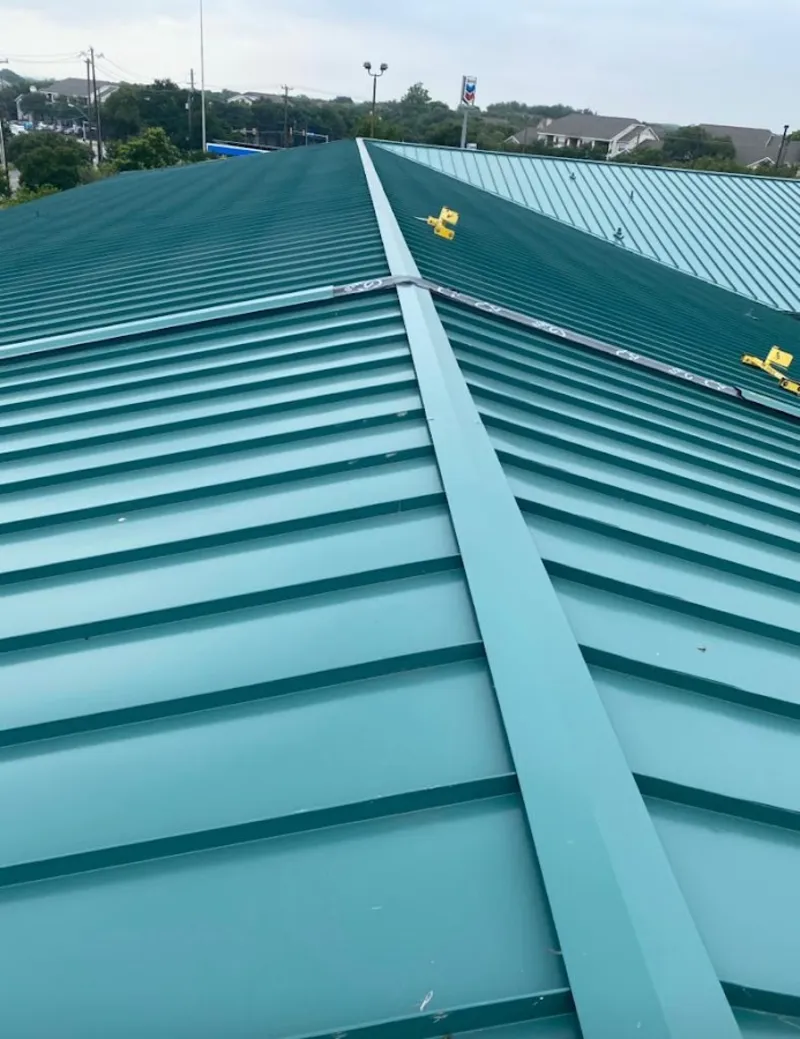 Green commercial metal roof ridge and valley for Metal Roof Repair in Wantage